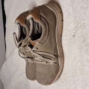 Skechers mens size 9.5 khaki colored lace up, cloth shoes.